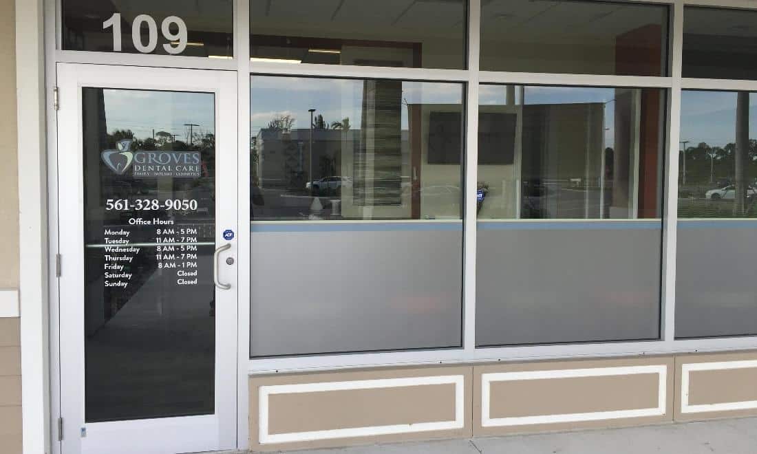 Groves Dental Care storefront with glass doors and windows at street entrance 109.